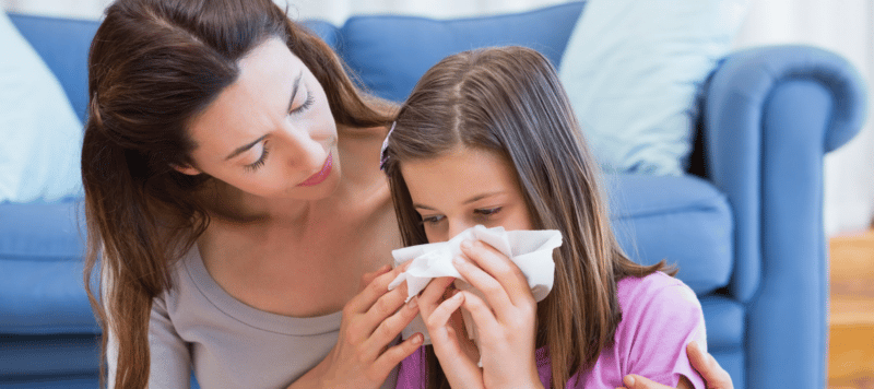child suffering from seasonal allergies